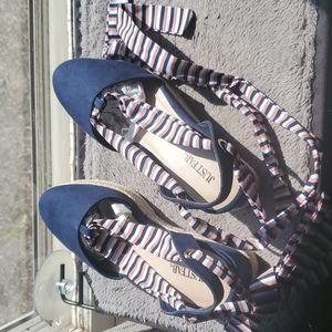 Navy esapadrilles with striped ties